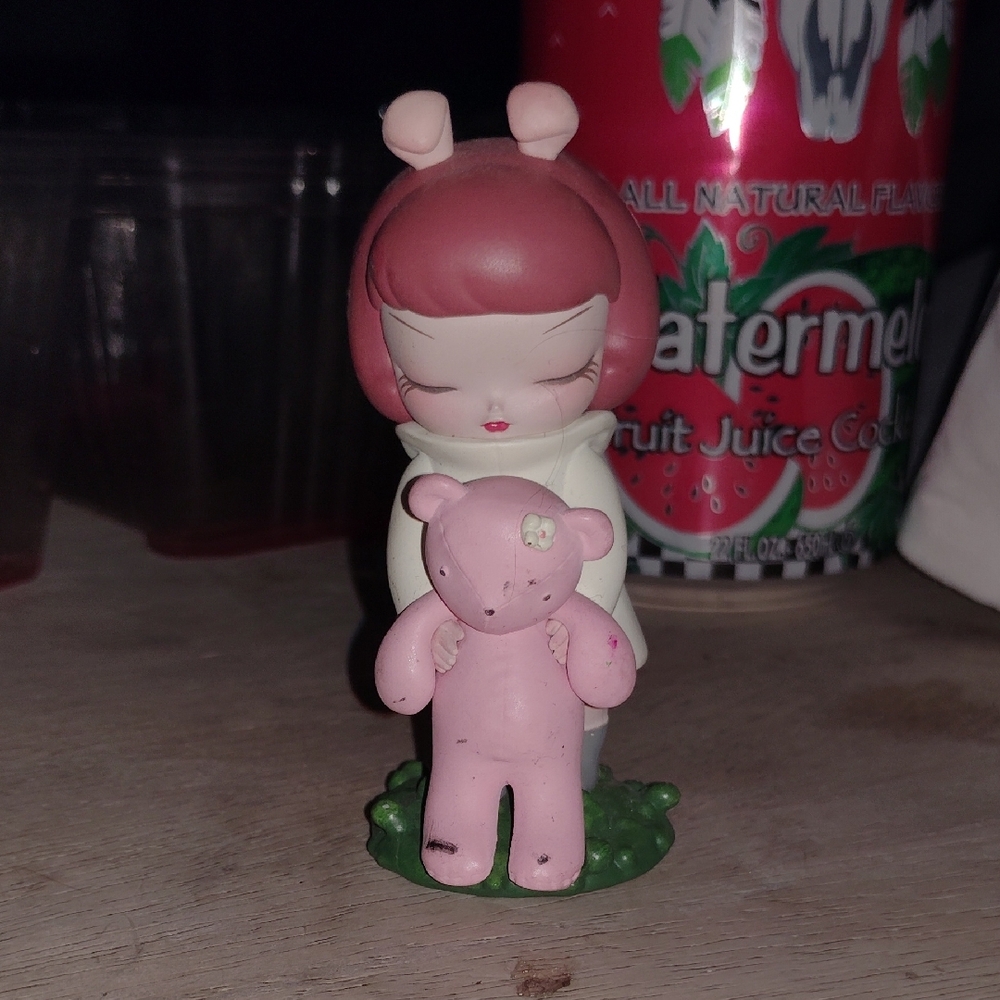Cute Pink Figurine with Bear